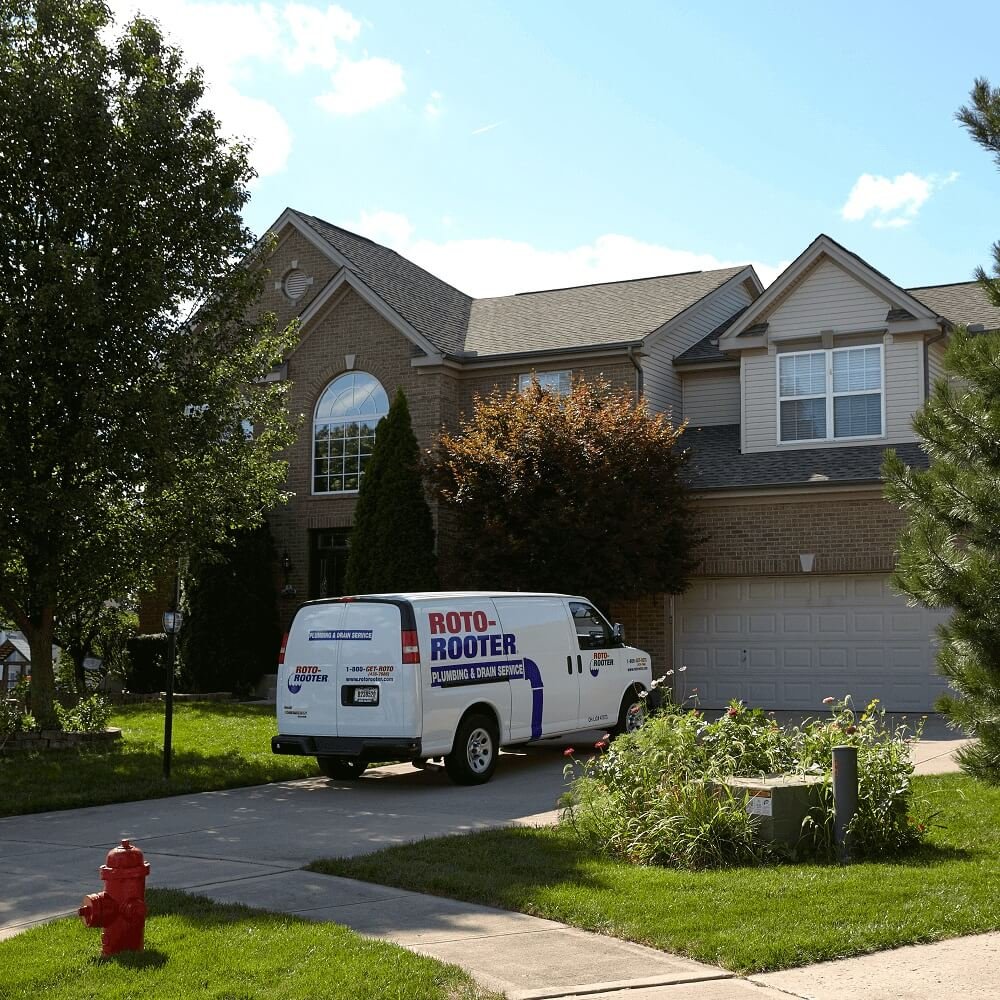 Roto-Rooter service van parked at a home in Charlotte